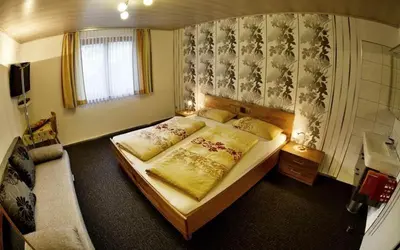 Ein Bett oder Betten in einem Zimmer der Unterkunft White Summit Appartement