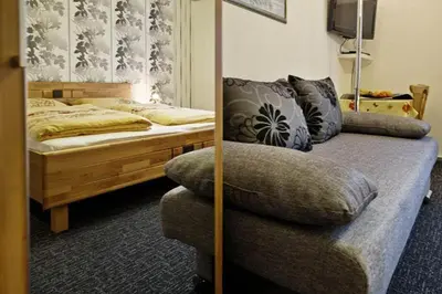 Ein Bett oder Betten in einem Zimmer der Unterkunft White Summit Appartement