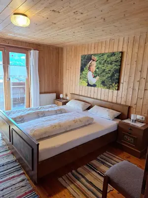 Ein Bett oder Betten in einem Zimmer der Unterkunft Ferienhof Muxel