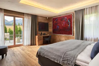 Ein Bett oder Betten in einem Zimmer der Unterkunft Chalet Alpha LUXURY Spa