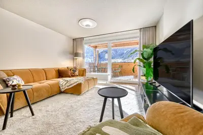 Ein Sitzbereich in der Unterkunft Panorama Deluxe by Hotel Lün