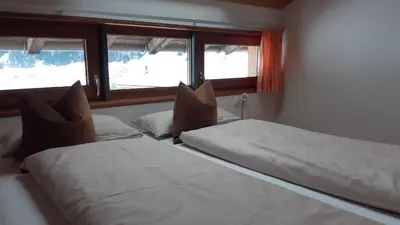 Ein Bett oder Betten in einem Zimmer der Unterkunft Haus Erna Schoppernau