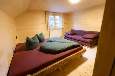 Ein Bett oder Betten in einem Zimmer der Unterkunft Bartles Hus