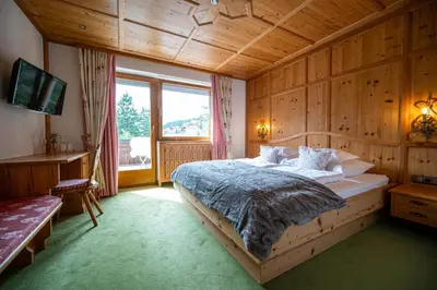 Ein Bett oder Betten in einem Zimmer der Unterkunft die AlpenRose