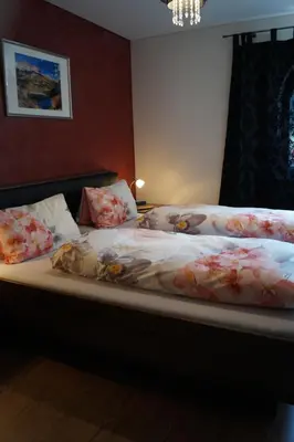 Ein Bett oder Betten in einem Zimmer der Unterkunft Landhaus Luzia