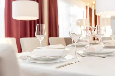 Ein Restaurant oder anderes Speiselokal in der Unterkunft Boutiquehotel Bergvilla Am Fuße der Alpen