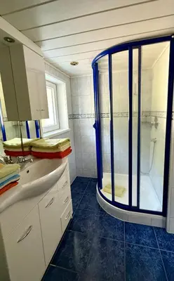 Ein Badezimmer in der Unterkunft Haus Can