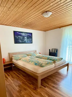Ein Bett oder Betten in einem Zimmer der Unterkunft Haus Can