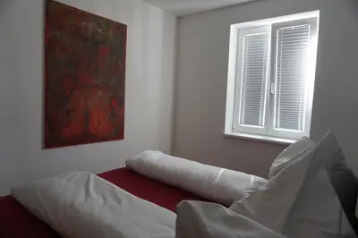 Ein Bett oder Betten in einem Zimmer der Unterkunft Ferienhaus Ritter