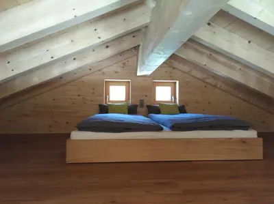 Ein Bett oder Betten in einem Zimmer der Unterkunft Walser Berg Chalets