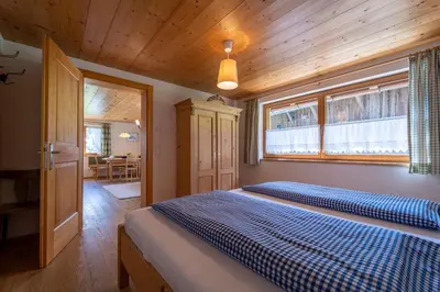 Ein Bett oder Betten in einem Zimmer der Unterkunft Ferienbauernhof Berlinger