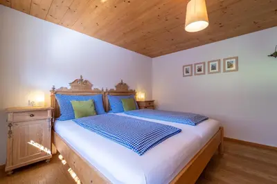 Ein Bett oder Betten in einem Zimmer der Unterkunft Ferienbauernhof Berlinger