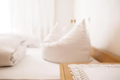 Ein Bett oder Betten in einem Zimmer der Unterkunft Gästehaus Meusburger