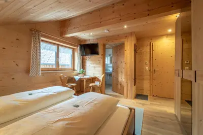 Ein Bett oder Betten in einem Zimmer der Unterkunft Forsthaus Schoppernau