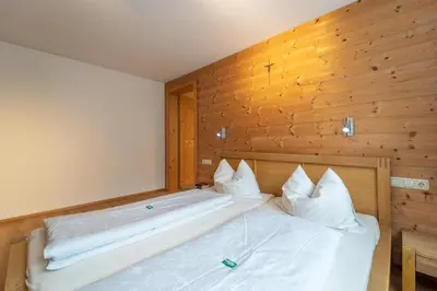 Ein Bett oder Betten in einem Zimmer der Unterkunft Forsthaus Schoppernau