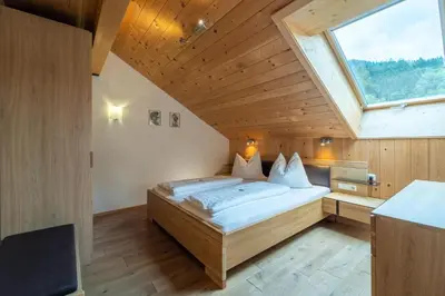 Ein Bett oder Betten in einem Zimmer der Unterkunft Forsthaus Schoppernau
