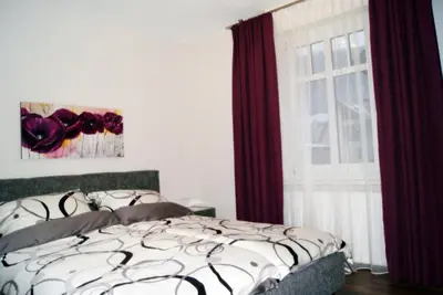 Ein Bett oder Betten in einem Zimmer der Unterkunft Haus Rosegger