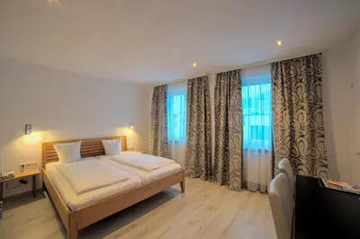 Ein Bett oder Betten in einem Zimmer der Unterkunft Hotel Central