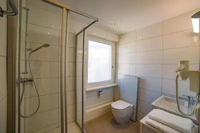 Ein Badezimmer in der Unterkunft Hotel Central