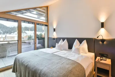 Ein Bett oder Betten in einem Zimmer der Unterkunft Hotel Sonnblick