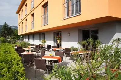 Ein Garten an der Unterkunft Das smarte Hotel garni