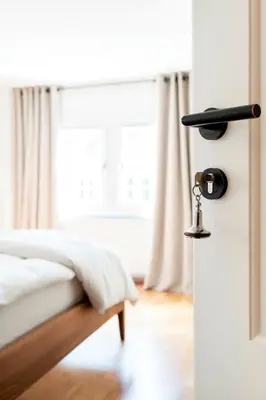 Ein Bett oder Betten in einem Zimmer der Unterkunft Hotel Zum Verwalter Dornbirn