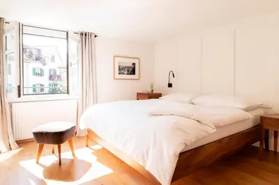 Ein Bett oder Betten in einem Zimmer der Unterkunft Hotel Zum Verwalter Dornbirn