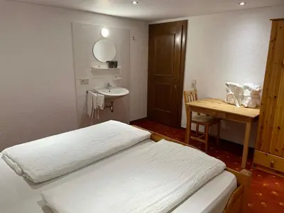 Ein Bett oder Betten in einem Zimmer der Unterkunft Haus Resi