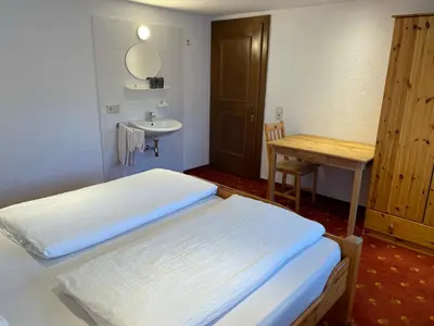 Ein Bett oder Betten in einem Zimmer der Unterkunft Haus Resi