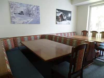 Ein Sitzbereich in der Unterkunft Der Berghof
