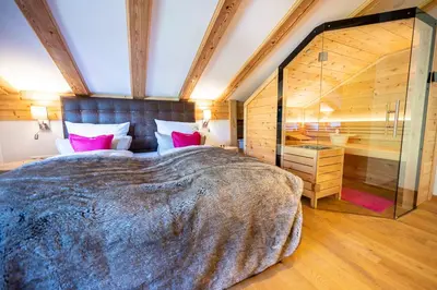 Ein Bett oder Betten in einem Zimmer der Unterkunft Alp-Chalet