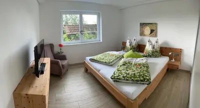 Ein Bett oder Betten in einem Zimmer der Unterkunft Maly´s Ferienwohnung