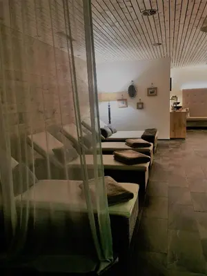Ein Sitzbereich in der Unterkunft Hotel Gretina