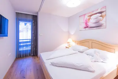 Ein Bett oder Betten in einem Zimmer der Unterkunft Damülser Horn