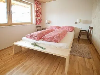 Ein Bett oder Betten in einem Zimmer der Unterkunft Ferienwohnung 