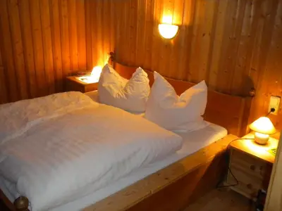 Ein Bett oder Betten in einem Zimmer der Unterkunft Ferienhaus Sinz