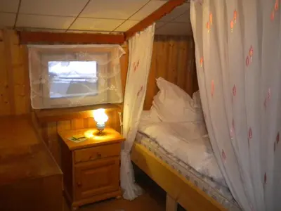 Ein Bett oder Betten in einem Zimmer der Unterkunft Ferienhaus Sinz