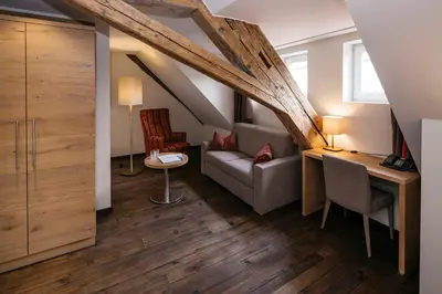 Ein Sitzbereich in der Unterkunft Hotel Gasthof Lamm
