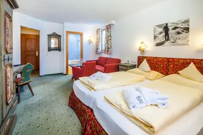 Ein Bett oder Betten in einem Zimmer der Unterkunft Hotel Anemone