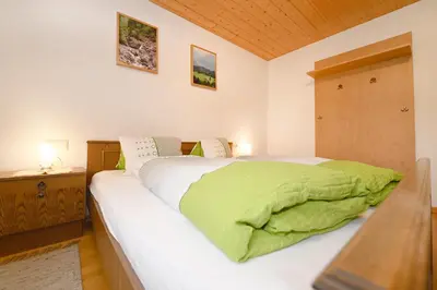 Ein Bett oder Betten in einem Zimmer der Unterkunft Haus Valuga