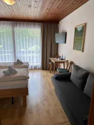 Ein Sitzbereich in der Unterkunft Gasthof Stern