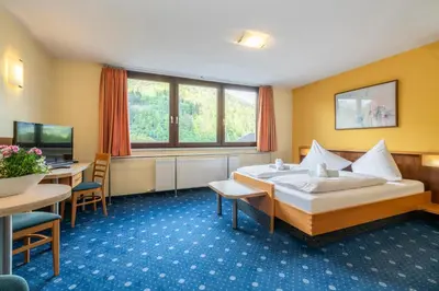 Ein Bett oder Betten in einem Zimmer der Unterkunft Gasthof Stern