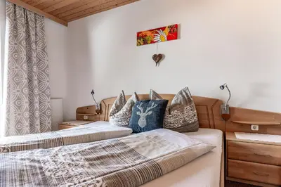 Ein Bett oder Betten in einem Zimmer der Unterkunft Appartement Mangeng