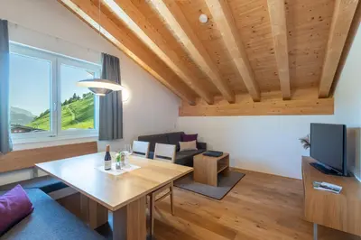 Ein Sitzbereich in der Unterkunft Rössle Appartements und Sport Rössle Skiverleih & Sportgeschäft