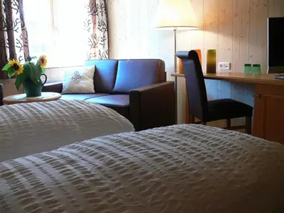 Ein Bett oder Betten in einem Zimmer der Unterkunft Gasthaus Engel