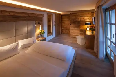 Ein Bett oder Betten in einem Zimmer der Unterkunft Alpine Lifestyle Berghotel Madlener