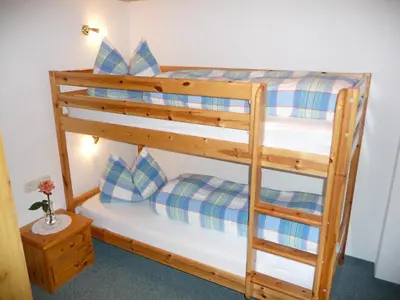 Ein Bett oder Betten in einem Zimmer der Unterkunft Haus Moosbrugger