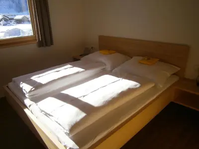 Ein Bett oder Betten in einem Zimmer der Unterkunft Haus Zitterklapfen