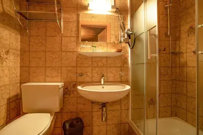 Ein Badezimmer in der Unterkunft Molto Haus