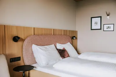 Ein Bett oder Betten in einem Zimmer der Unterkunft Hotel Marvia